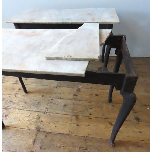 83 - A PAIR OF VINTAGE IRON CONSOLE TABLES WITH MARBLE TOPS, a rectangular white marble slab sat atop a c... 