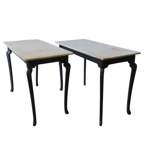 83 - A PAIR OF VINTAGE IRON CONSOLE TABLES WITH MARBLE TOPS, a rectangular white marble slab sat atop a c... 