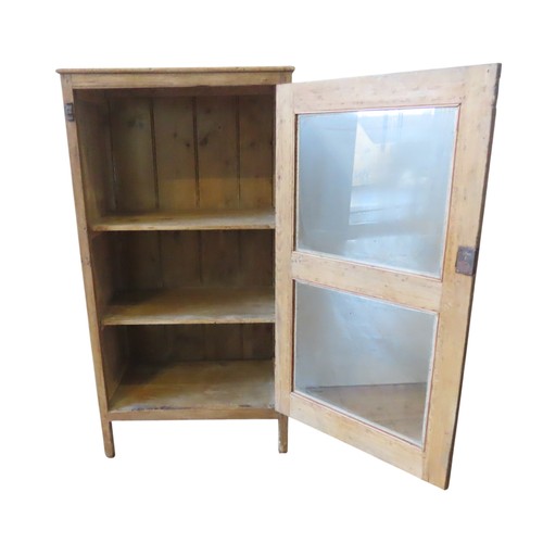 8 - A VICTORIAN PINE FOOD SAFE, rectangular form, the glazed door opening to reveal two interior shelves... 