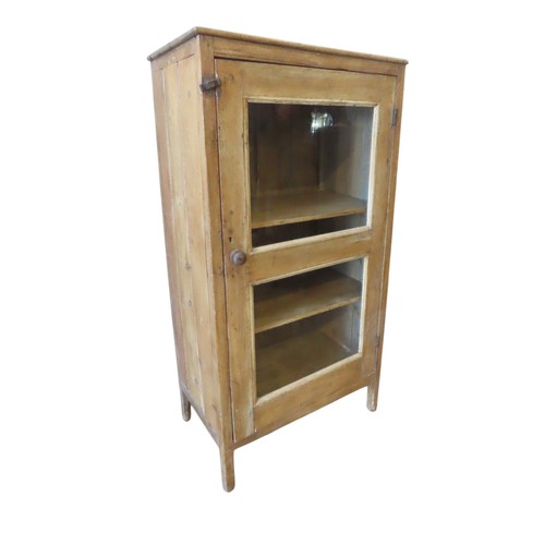 8 - A VICTORIAN PINE FOOD SAFE, rectangular form, the glazed door opening to reveal two interior shelves... 