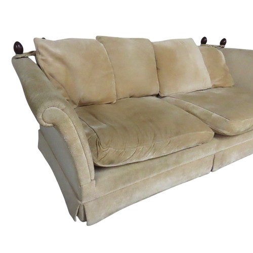 3 - A KNOLE-STYLE SETTEE, covered in a pale gold coloured fabric, with drop-down scroll armsHeight 90cm ... 