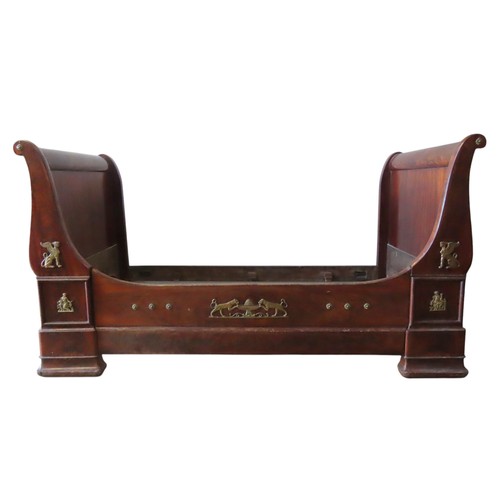 84 - A MAHOGANY EMPIRE STYLE SLEIGH BED, 19TH CENTURY, in the Egyptian revival taste105 cm high x 193 cm ... 