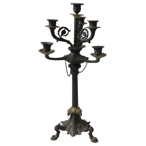 69 - A BRONZE EMPIRE STYLE CANDELABRA, the central sconce encircled by three scrolling branches, with a t... 