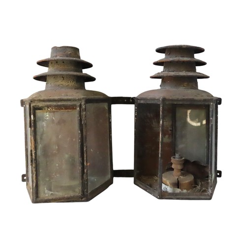 66 - A PAIR OF GEORGE III PAINTED TIN LANTERNS AND A CORNER LANTERN, all later converted to electric, the... 