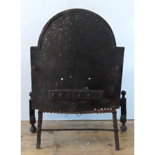 16 - A CAST-IRON FIRE GRATE, 20TH CENTURY, with arched fire back65 x 74 x 41 cmProvenance: Selected Conte... 