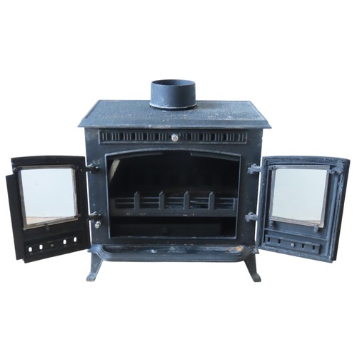 15 - A CONTEMPORARY CAST-IRON WOOD BURNING STOVE, model number JA032 (2010) with metal label affixed to t... 