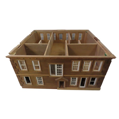 71 - A WOODEN DOLL'S HOUSE, in the style of a Georgian country house60 x 71 x 61 cmProvenance: Selected C... 