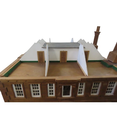 71 - A WOODEN DOLL'S HOUSE, in the style of a Georgian country house60 x 71 x 61 cmProvenance: Selected C... 