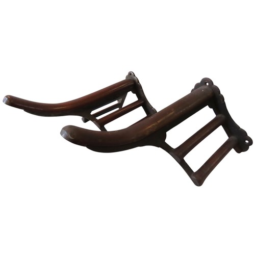 57 - A PAIR OF MUSGROVE CAST-IRON AND MAHOGANY SADDLE RACKS, LATE 19TH CENTURY, with factory marks to the... 