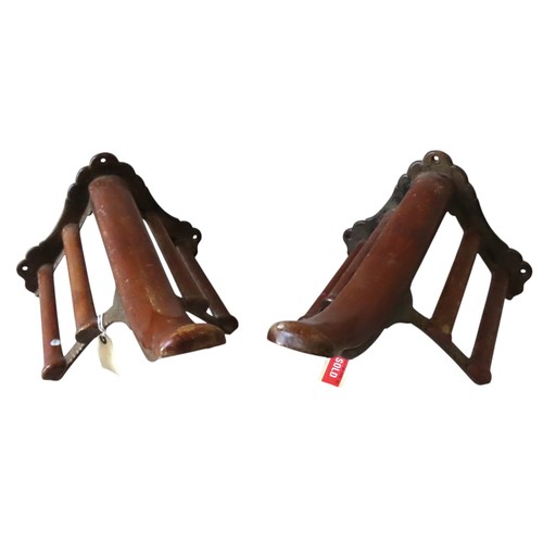 55 - A PAIR OF MUSGRAVE CAST-IRON & MAHOGANY SADDLE RACKS, LATE 19TH CENTURY, stamped on the undersid... 