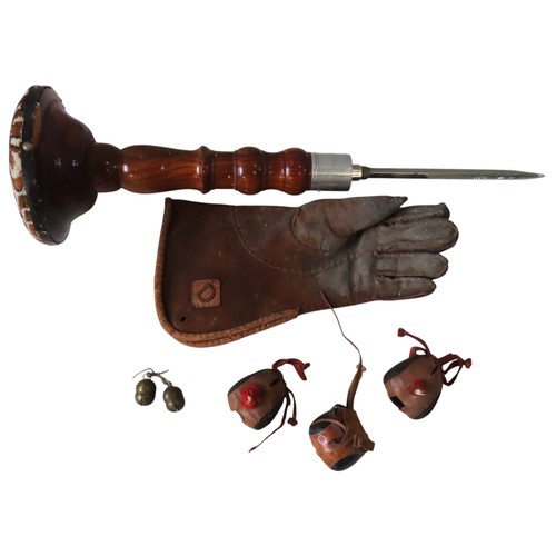 36 - A COLLECTION OF FALCONRY ACCESORIES, the lot comprised of a turned wooden perch, a leather gauntlet,... 