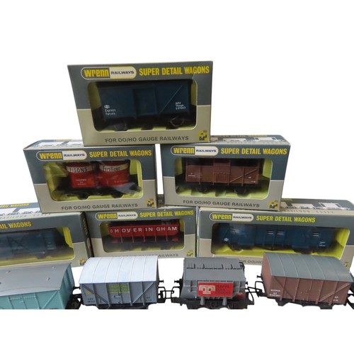 374 - Wrenn OO/HO Rolling Stock including six boxed items and various loose rolling stock.