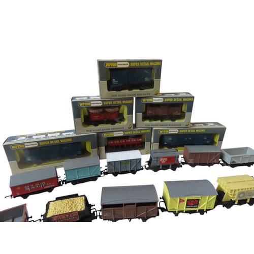 374 - Wrenn OO/HO Rolling Stock including six boxed items and various loose rolling stock.