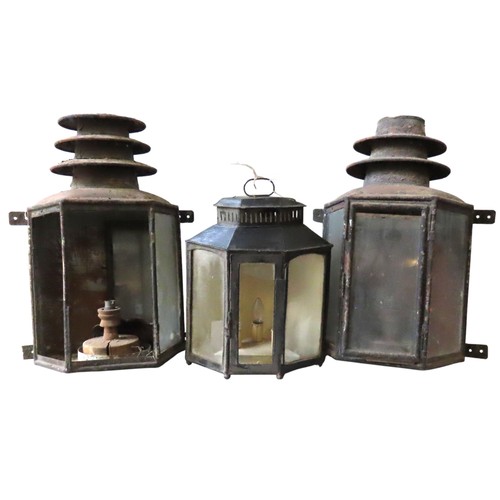 66 - A PAIR OF GEORGE III PAINTED TIN LANTERNS AND A CORNER LANTERN, all later converted to electric, the... 