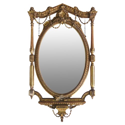 73 - AN ELEGANT ADAMS-STYLE GILT FRAMED MIRROR, 19TH CENTURY, the oval framed plate flanked by twin flute... 