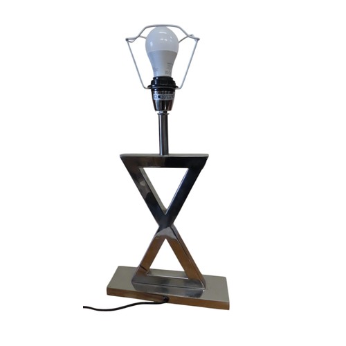 617 - AN OKA CHROME TABLE LAMP, LATE 20TH CENTURY, the 'X' form base raised on a rectangular plinth45 cm h... 