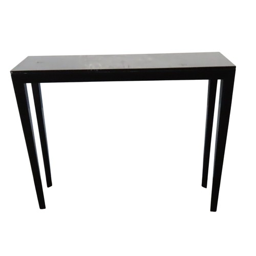 619 - AN OKA BLACK LACQUERED CONSOLE TABLE, LATE 20TH CENTURY, the rectangular top raised on elegant taper... 