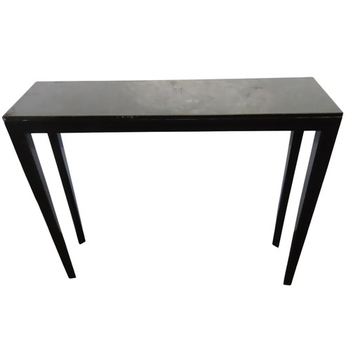 619 - AN OKA BLACK LACQUERED CONSOLE TABLE, LATE 20TH CENTURY, the rectangular top raised on elegant taper... 