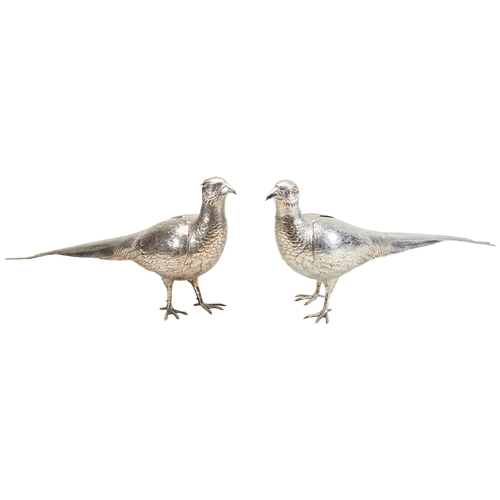 115 - A PAIR OF LARGE SILVER TABLE PHEASANTS with articulated wings and removeable heads, the neck collars... 