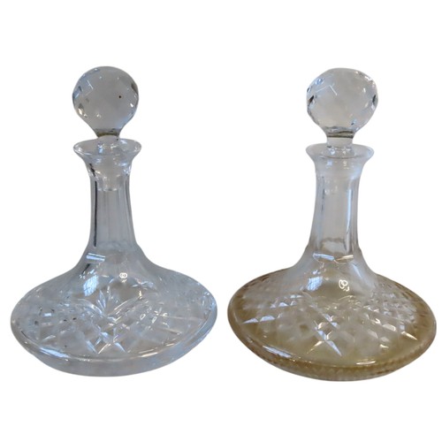 62 - TWO CUT GLASS SHIP'S DECANTERS LATE 19TH CENTURY both with faceted globular stoppers 25.5 cm high ma... 