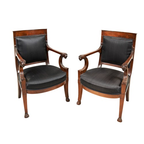 83 - A GOOD PAIR OF FRENCH MAHOGANY OPEN ARMCHAIRS, circa 1825, the padded square backs and stuffed over ... 