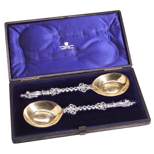 138 - A PAIR OF SILVER APOSTLE SPOONS, London 1874, possibly Francis Higgins III, the figural terminals ov... 