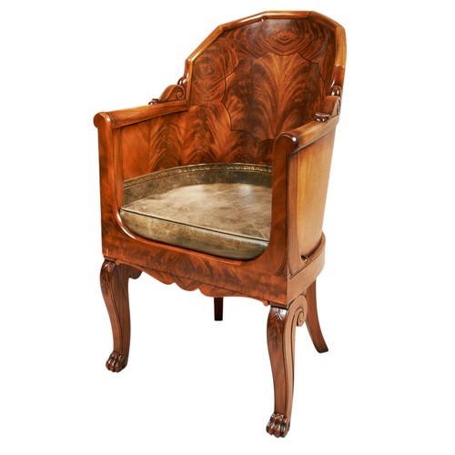 139 - A FINE CONTINENTAL EMPIRE MAHOGANY AND INLAID ARMCHAIR, early 20th century, the shaped oyster veneer... 