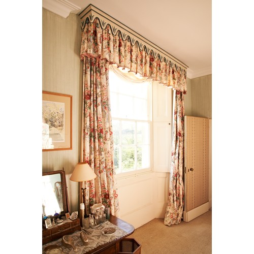 101 - TWO PAIRS OF CURTAINS in a floral chintz with gathered fabric pelmets and wooden painted window pelm... 