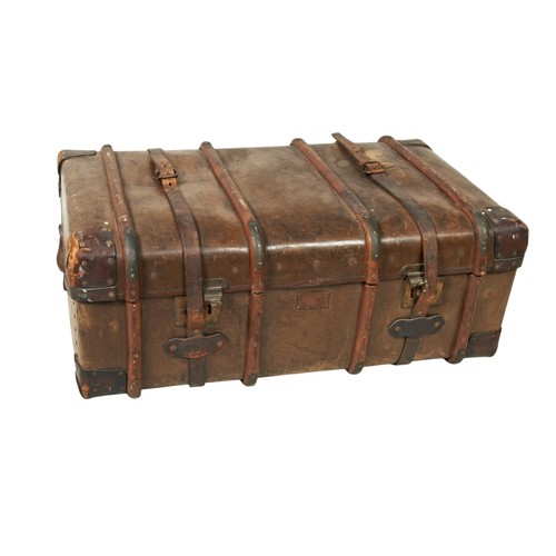 86 - A LEATHER WOODEN BOUND TRAVELLING TRUNK, early 20th century, by Cave & Sons, London, with branch... 