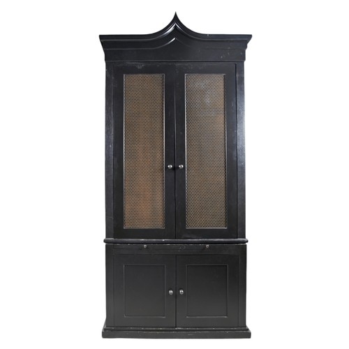 114 - A PAIR OF REGENCY STYLE BLACK PAINTED LIBRARY CABINETS, modern, the arched top over two gilt panel d... 