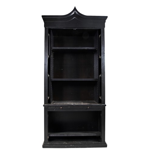 114 - A PAIR OF REGENCY STYLE BLACK PAINTED LIBRARY CABINETS, modern, the arched top over two gilt panel d... 