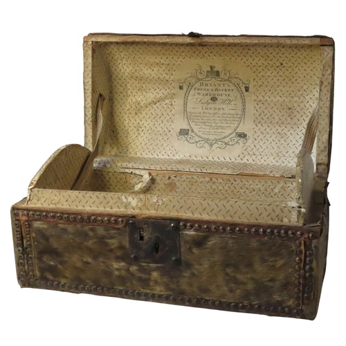 439 - A REGENCY PONYHIDE DOME-TOP TRAVEL TRUNKCIRCA 1820the hinged top bearing the initials W.H in metal s... 