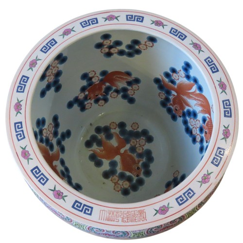 490 - LARGE PAIR OF FAMILLE ROSE 'FISH' BOWLS ON STANDS20TH CENTURYwith apocryphal Qianlong seal marks 52c... 