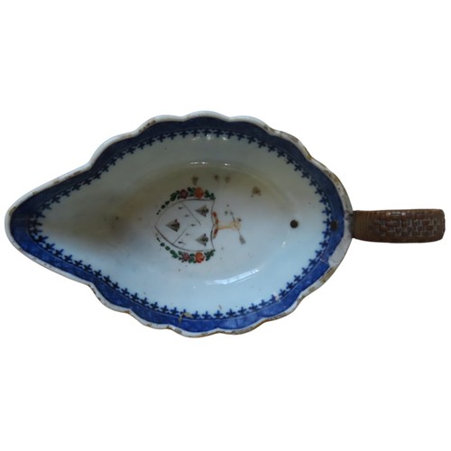 473 - A CHINESE EXPORT ARMORIAL CERAMIC SAUCE BOAT with a metal and whicker handle repair, a Victorian arm... 