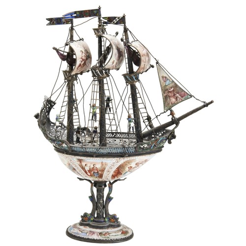 557 - AN AUSTRIAN ENAMELLED SILVER NEF, 19TH CENTURYthe pierced deck surmounted by three rigged masts with... 