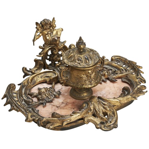 492 - A LOUIS XV-STYLE GILT BRONZE INKWELLCIRCA 1880in the Rococo taste, the urn-style inkwell sat upon a ... 