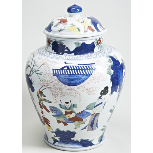 489 - A LARGE CHINESE WUCAI JAR AND COVER20TH CENTURYthe sides painted with female attendants and boys in ... 