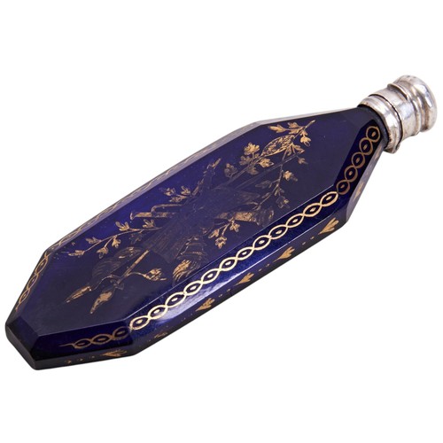 465 - A GEORGE III BRISTOL BLUE GLASS SCENT BOTTLECIRCA 1780elongated octagonal form with gilt decorated s... 