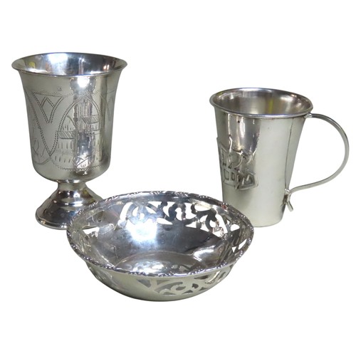 514 - A SILVER KIDDUSH CUPCIRCA 1895the tapering sides with primitively chased decoration depicting buildi... 