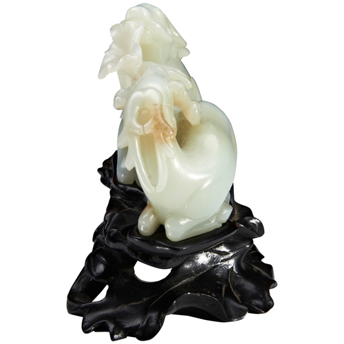 36 - A FINE CARVED PALE-GREEN JADE GROUP OF TWO STAGS QIANLONG PERIOD (1736-1795)青白玉鹿衔玉兰摆件 乾隆 1736-1795mo... 