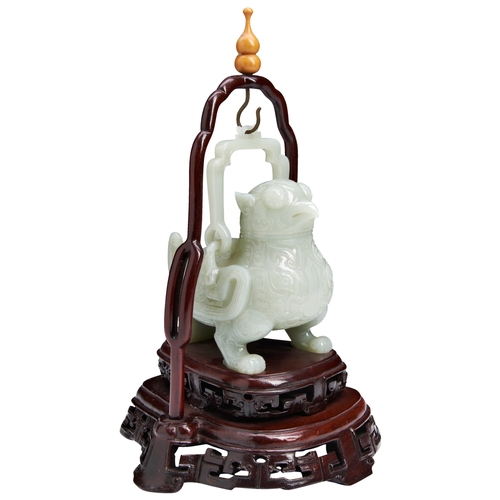 104 - A GOOD PALE-CELADON JADE 'MYTHICAL BEAST' CENSER AND COVER 20TH CENTURY白玉瑞兽摆件 十二世纪with a wood stand ... 