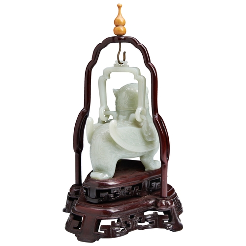 104 - A GOOD PALE-CELADON JADE 'MYTHICAL BEAST' CENSER AND COVER 20TH CENTURY白玉瑞兽摆件 十二世纪with a wood stand ... 