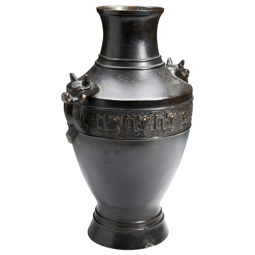 148 - A LARGE ARCHAISTIC GOLD AND SILVER INLAID BRONZE VASEMING DYNASTY, 17TH CENTURY兽耳铜壶 明 十七世纪of baluste... 