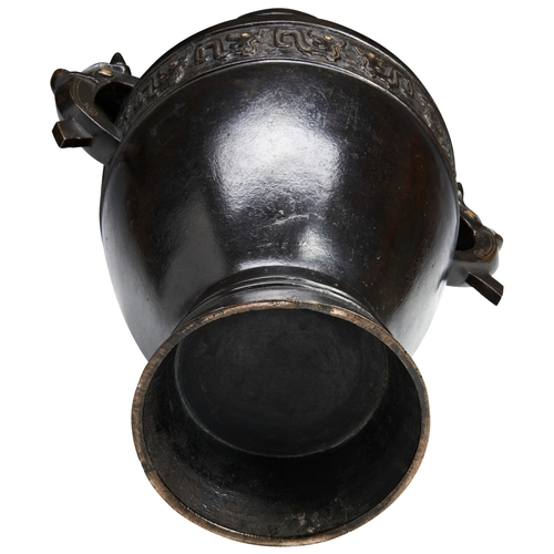 148 - A LARGE ARCHAISTIC GOLD AND SILVER INLAID BRONZE VASEMING DYNASTY, 17TH CENTURY兽耳铜壶 明 十七世纪of baluste... 