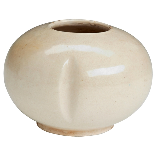 158 - A DING-TYPE BRUSH WASHERNORTHER SONG DYNASTY定窑水盂 北宋of compressed lobed flora-form, covered in a tran... 