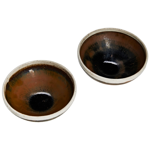 160 - A RARE NEAR PAIR OF 'HARE'S FUR' WHITE-RIMMED TEA BOWLSNORTHERN SONG DYNASTY建盏一对 北宋each covered with... 