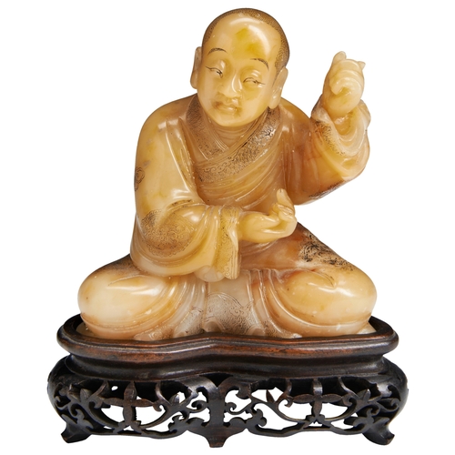 A FINE CARVED SOAPSTONE FIGURE OF A LUOHAN