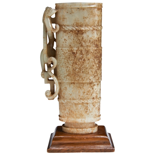 121 - A RARE ARCHAISTIC JADE 'CHILONG' LIBATION CUPSONG DYNASTY (960-1279)螭龙仿古褐玉杯 宋 of flattened cylindric... 