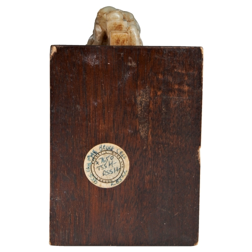 121 - A RARE ARCHAISTIC JADE 'CHILONG' LIBATION CUPSONG DYNASTY (960-1279)螭龙仿古褐玉杯 宋 of flattened cylindric... 