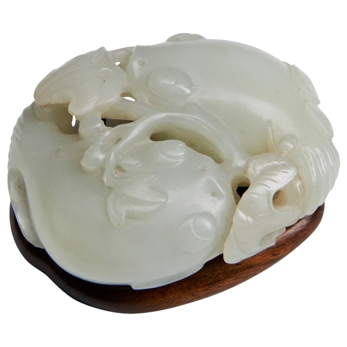 127 - A WHITE JADE 'CATFISH' GROUPQING DYNASTY, 19TH CENTURY 白玉‘莲鲇有余’ 清 十九世纪 formed as two fish forming a ... 